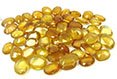 Omega-3 fish oil capsules on blue surface Stock Photo - 3401795